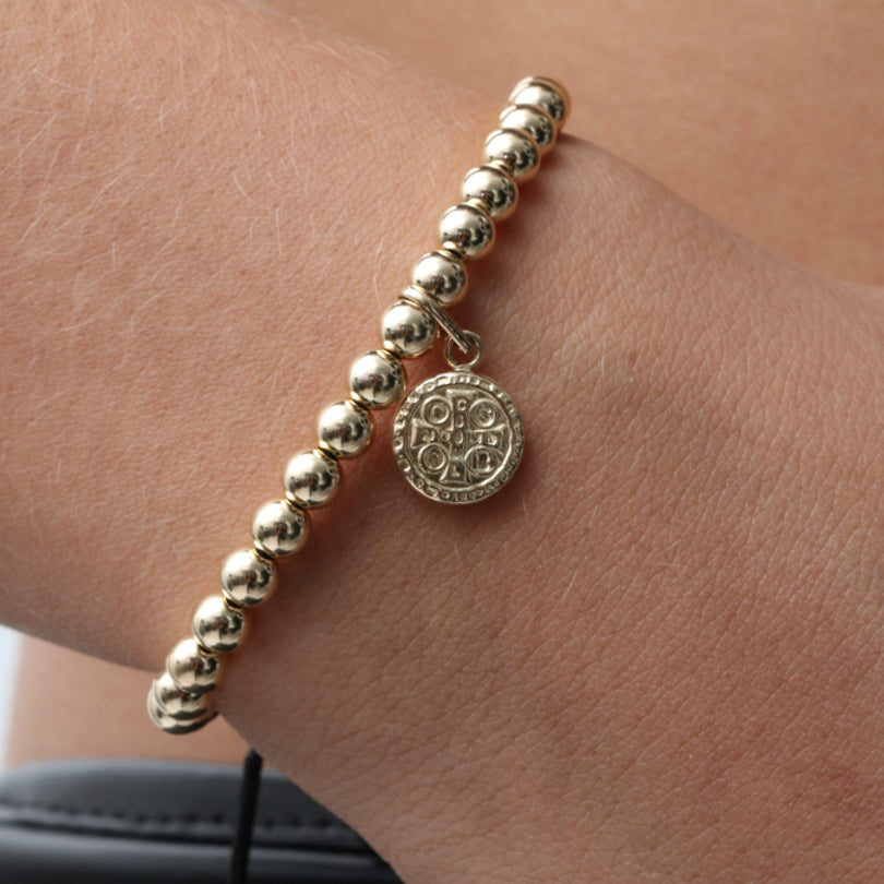 Pulsera para Protecion  San Benito 6mm Dorada 6mm dorada con tejido en color