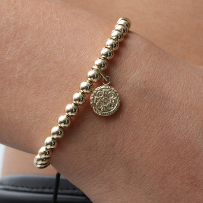 Pulsera para Protecion  San Benito 6mm Dorada 6mm dorada con tejido en color