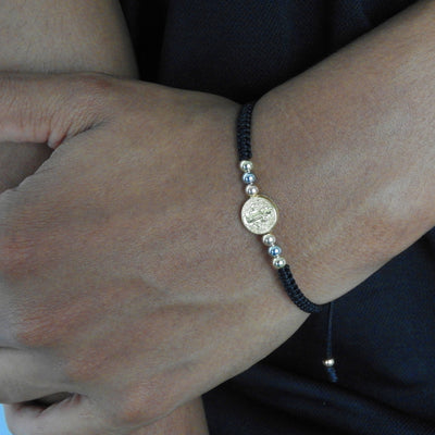 Pulsera tejida san Benito tres tonos
