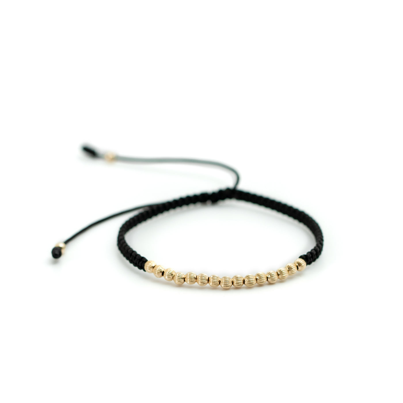 Pulsera ajustable oro laminado 18k tejida bola 3mm diamantada acanalada