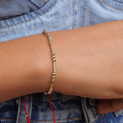 Pulsera oro laminado especial dorada canutillo bola 3mm trío