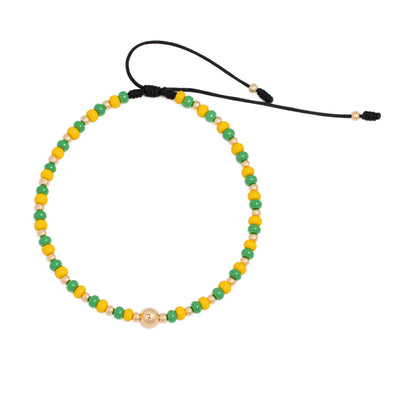 Tobillera oro laminado 18k en mostacilla con bola 6mm diamantada