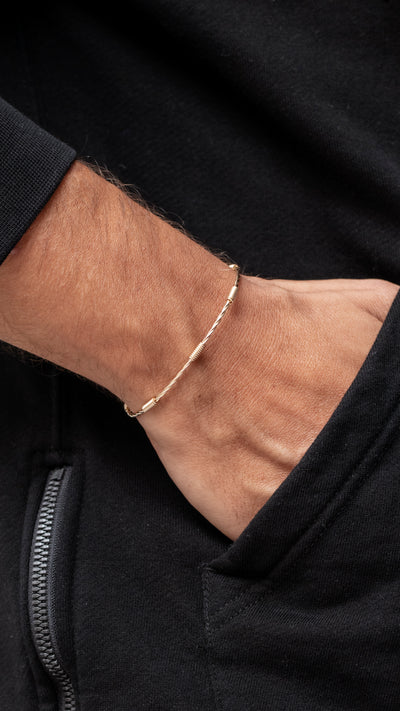 PULSERA ENTORCHADA 7 NUDOS DORADA (RIAZA -3T)